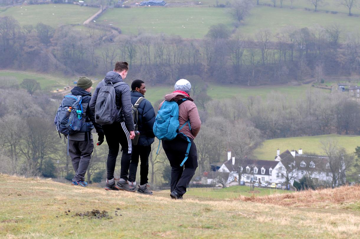 Group of people out walking in the countryside